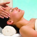 A woman having a head massage